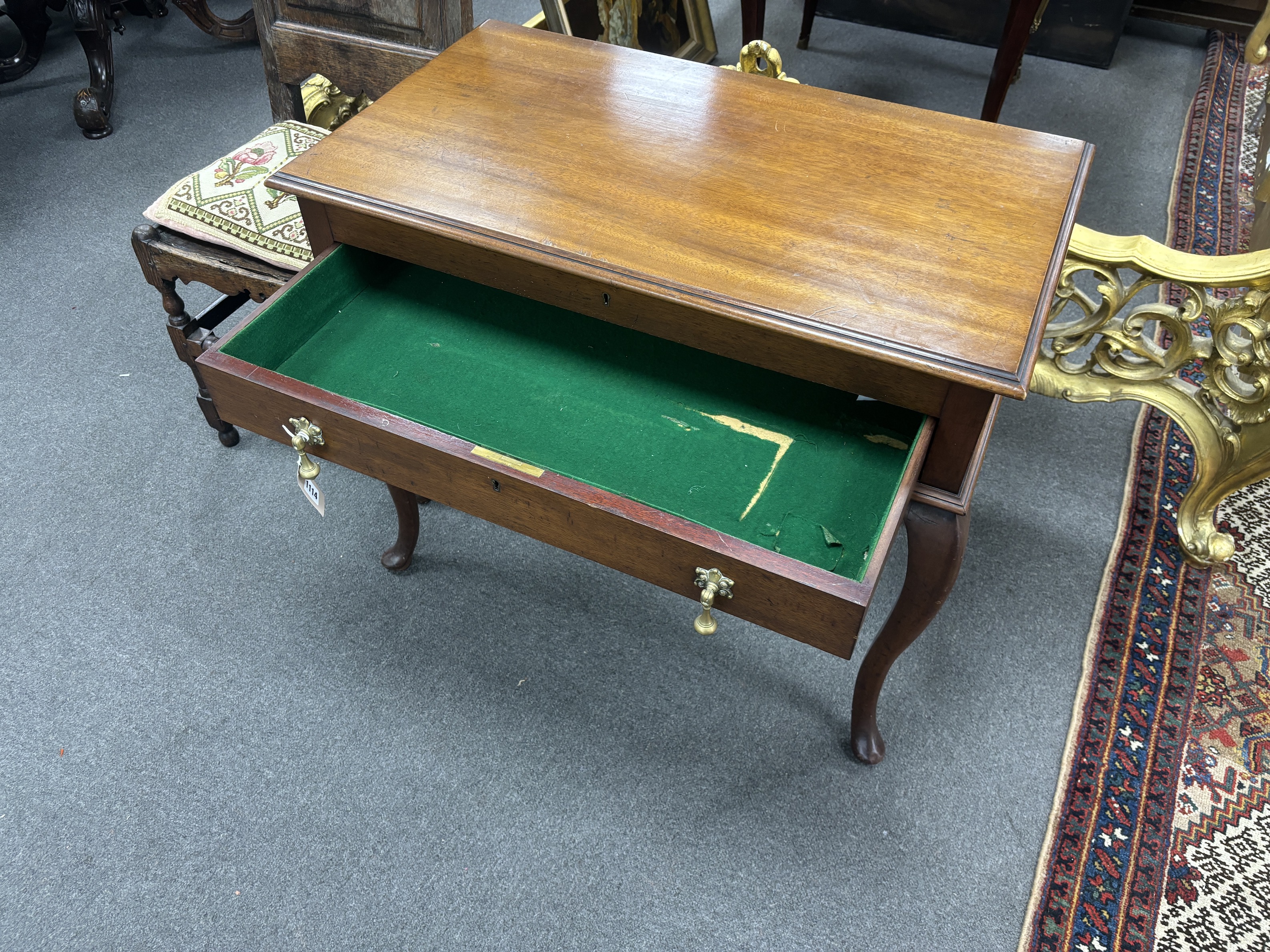 A 1920's mahogany cutlery table, width 85cm, depth 50cm, height 73cm